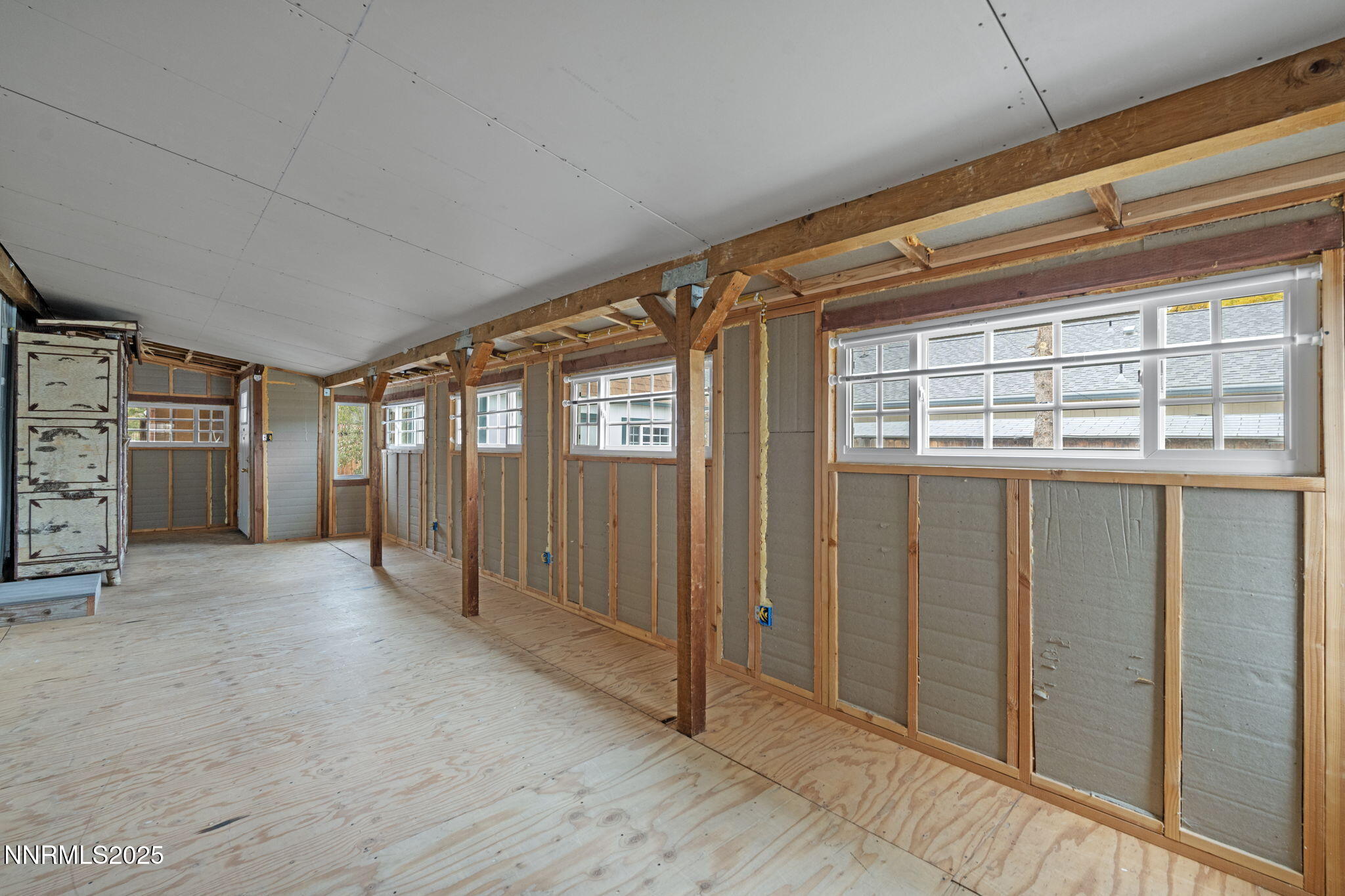 180 Staci Way Sun Valley, NV 89433 - Photo 40 of 71 a view of empty room with windows