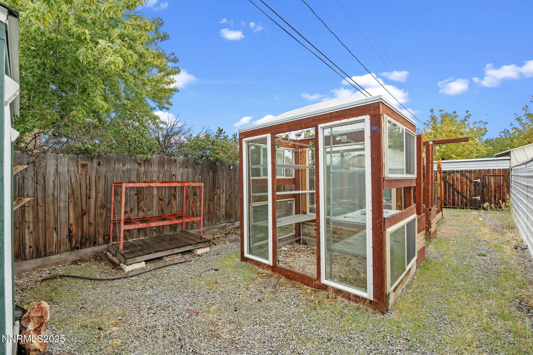 180 Staci Way Sun Valley, NV 89433 - Photo 49 of 71 a view of backyard with tv