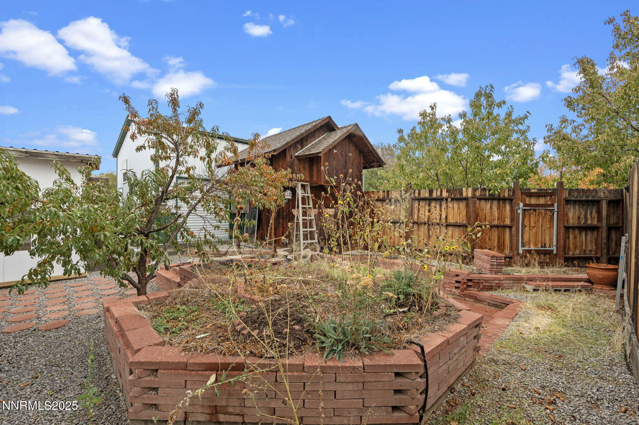 180 Staci Way Sun Valley, NV 89433 - Photo 51 of 71 a view of a house with a yard