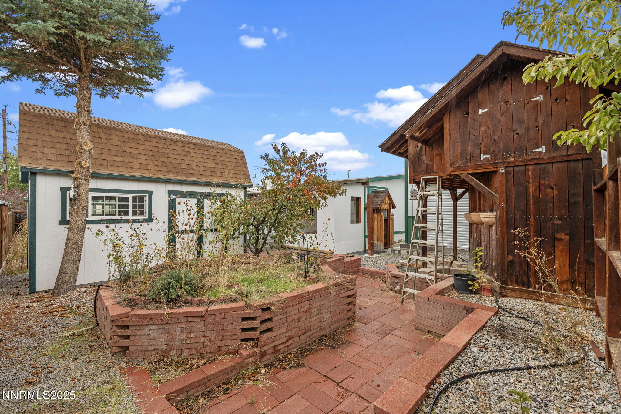 180 Staci Way Sun Valley, NV 89433 - Photo 53 of 71 a front view of a house with garden