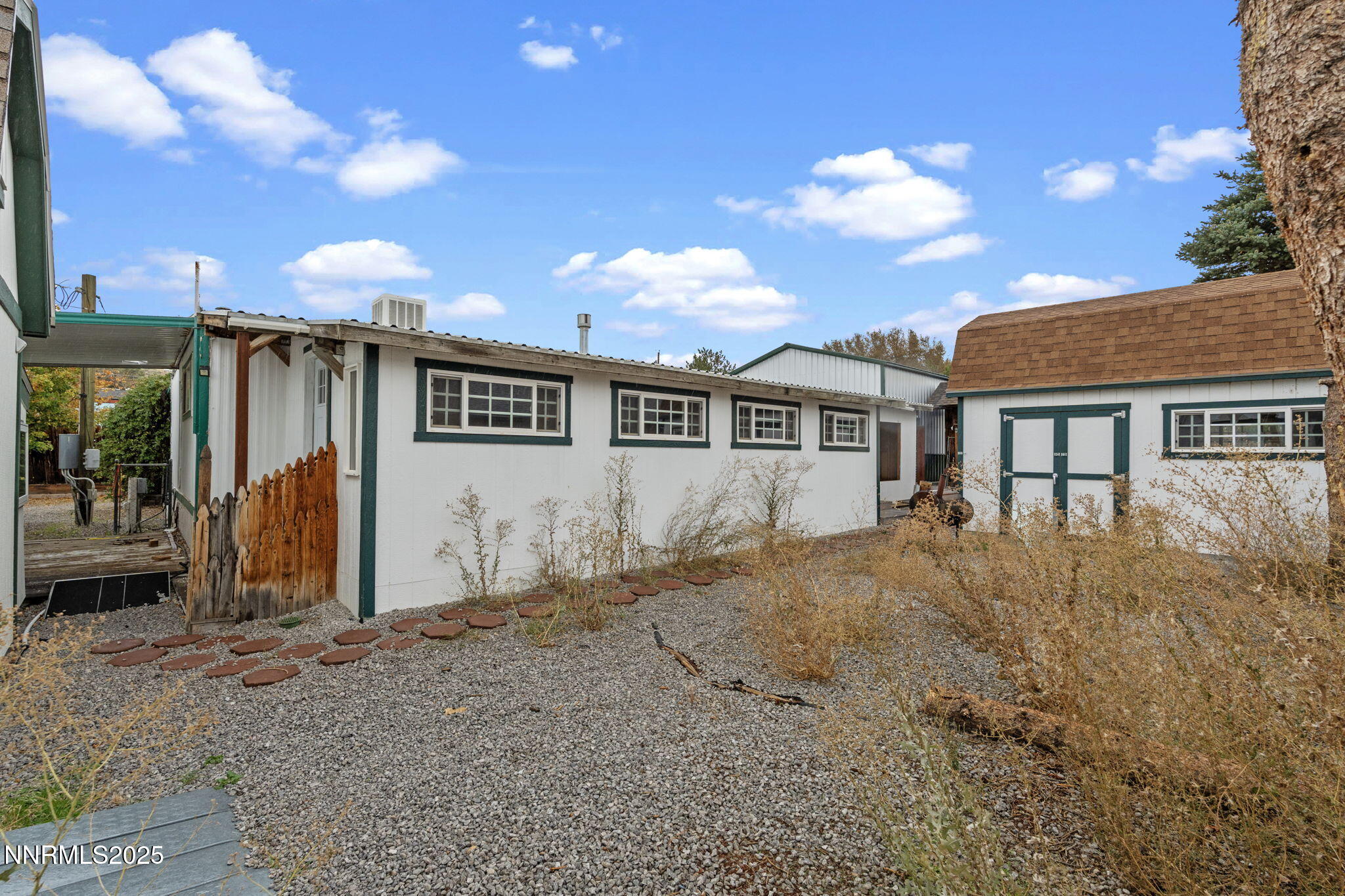 180 Staci Way Sun Valley, NV 89433 - Photo 61 of 71 a view of a house with a backyard space and balcony