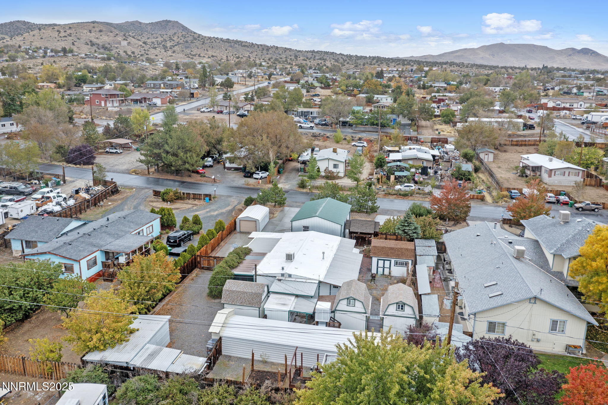 180 Staci Way Sun Valley, NV 89433 - Photo 70 of 71 an aerial view of a house with a yard