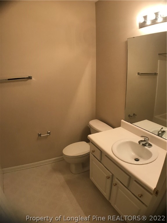 522 Lionshead Road, Unit 3 Fayetteville, NC 28311 - Photo 14 of 20 a bathroom with a sink and a toilet