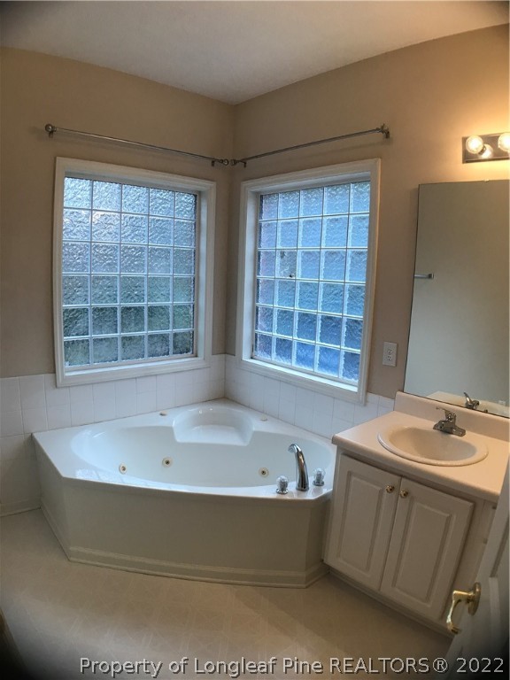 522 Lionshead Road, Unit 3 Fayetteville, NC 28311 - Photo 17 of 20 a bathroom with a sink and a bathtub