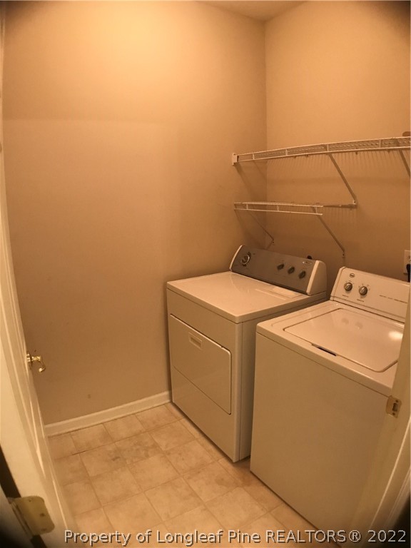 522 Lionshead Road, Unit 3 Fayetteville, NC 28311 - Photo 6 of 20 a utility room with dryer and washer