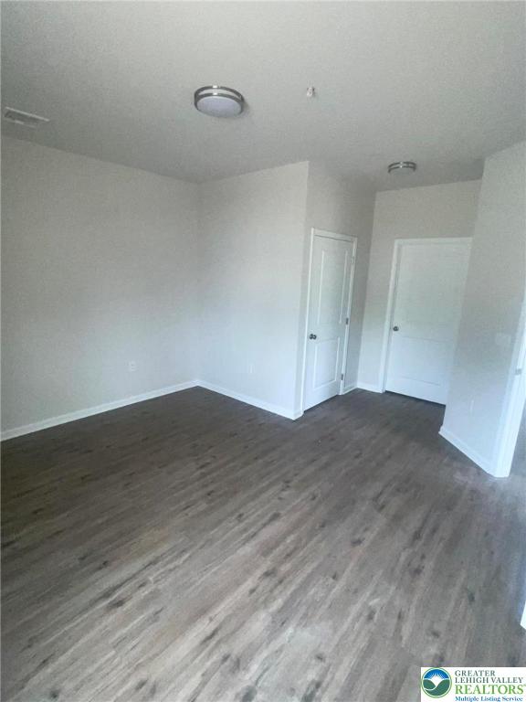 1036 Blake Street, Unit 101 Bethlehem, PA 18017 - Photo 7 of 12 a view of empty room with wooden floor
