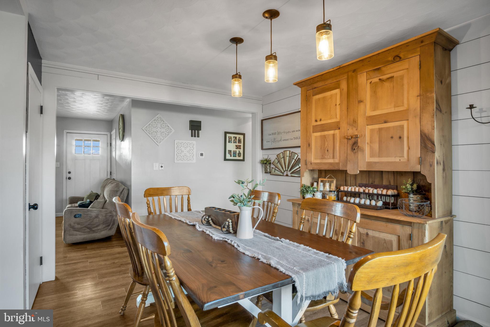 623 Bloserville Road Newville, PA 17241 - Photo 15 of 49 a view of a dining room with furniture and wooden floor