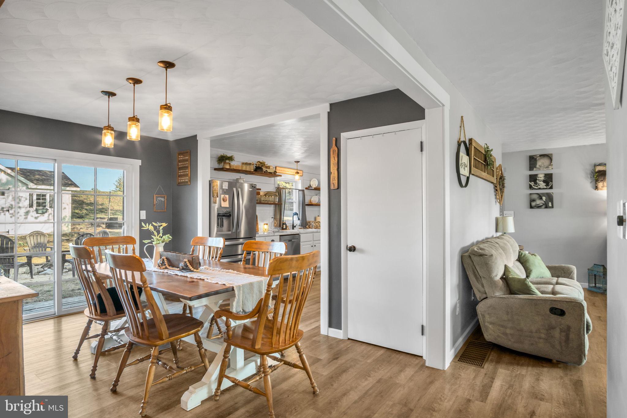 623 Bloserville Road Newville, PA 17241 - Photo 17 of 49 a view of a dining room with furniture and wooden floor