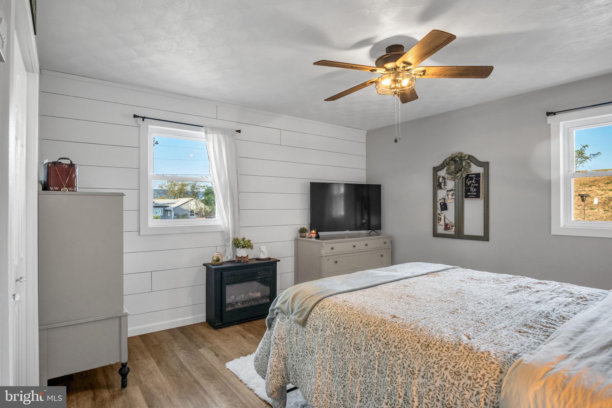 623 Bloserville Road Newville, PA 17241 - Photo 22 of 49 a bedroom with a bed and a flat screen tv