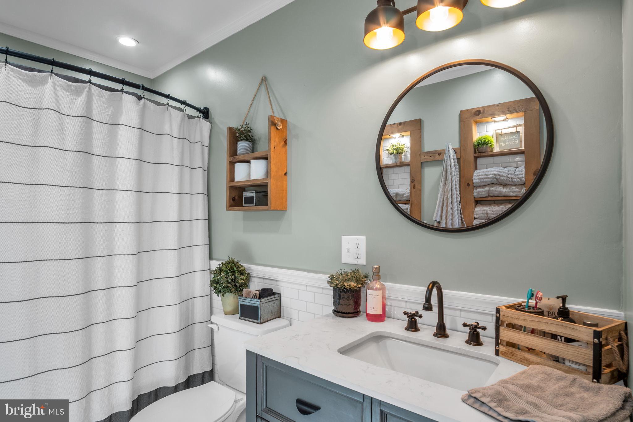 623 Bloserville Road Newville, PA 17241 - Photo 23 of 49 a bathroom with a sink mirror and toilet