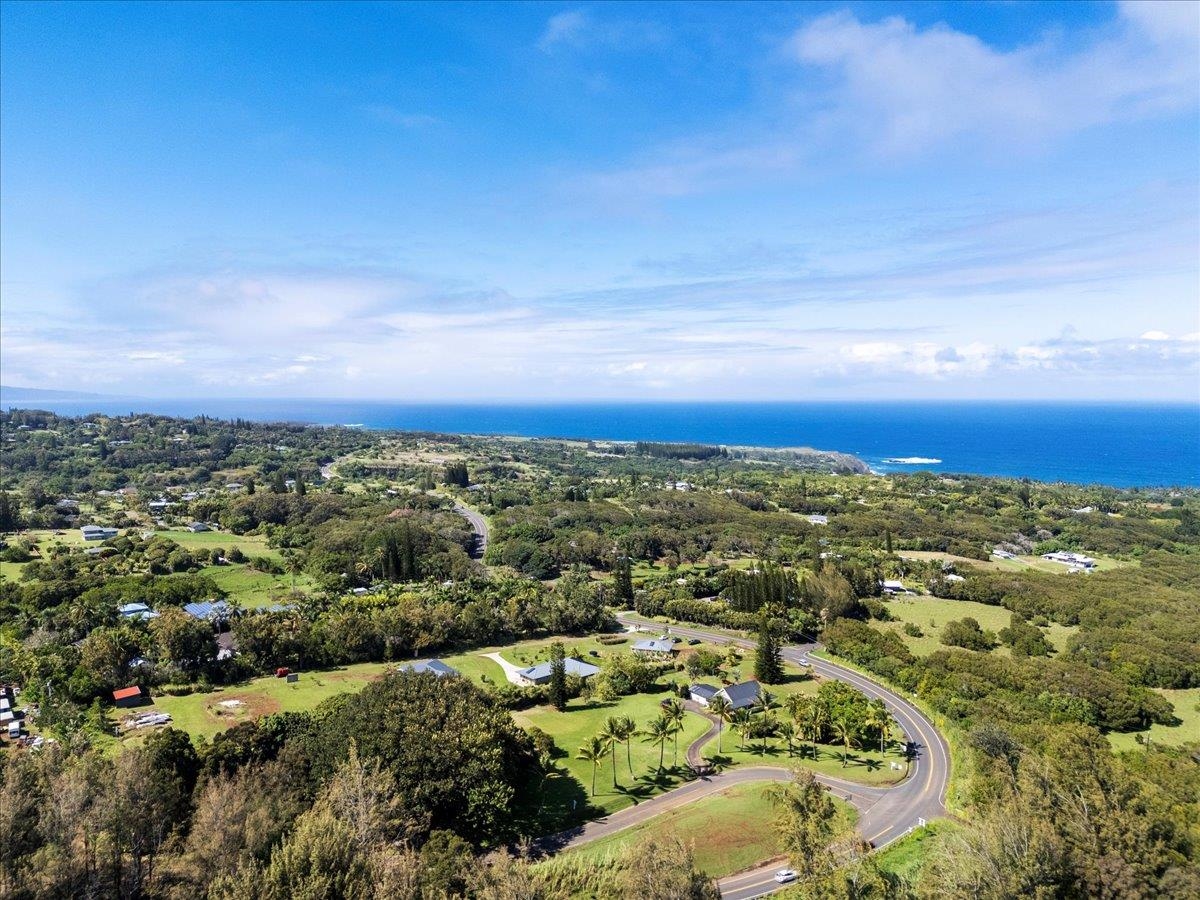 44 Kaupakalua Road Haiku, HI 96708 - Photo 2 of 48 an aerial view of residential houses with city and green space