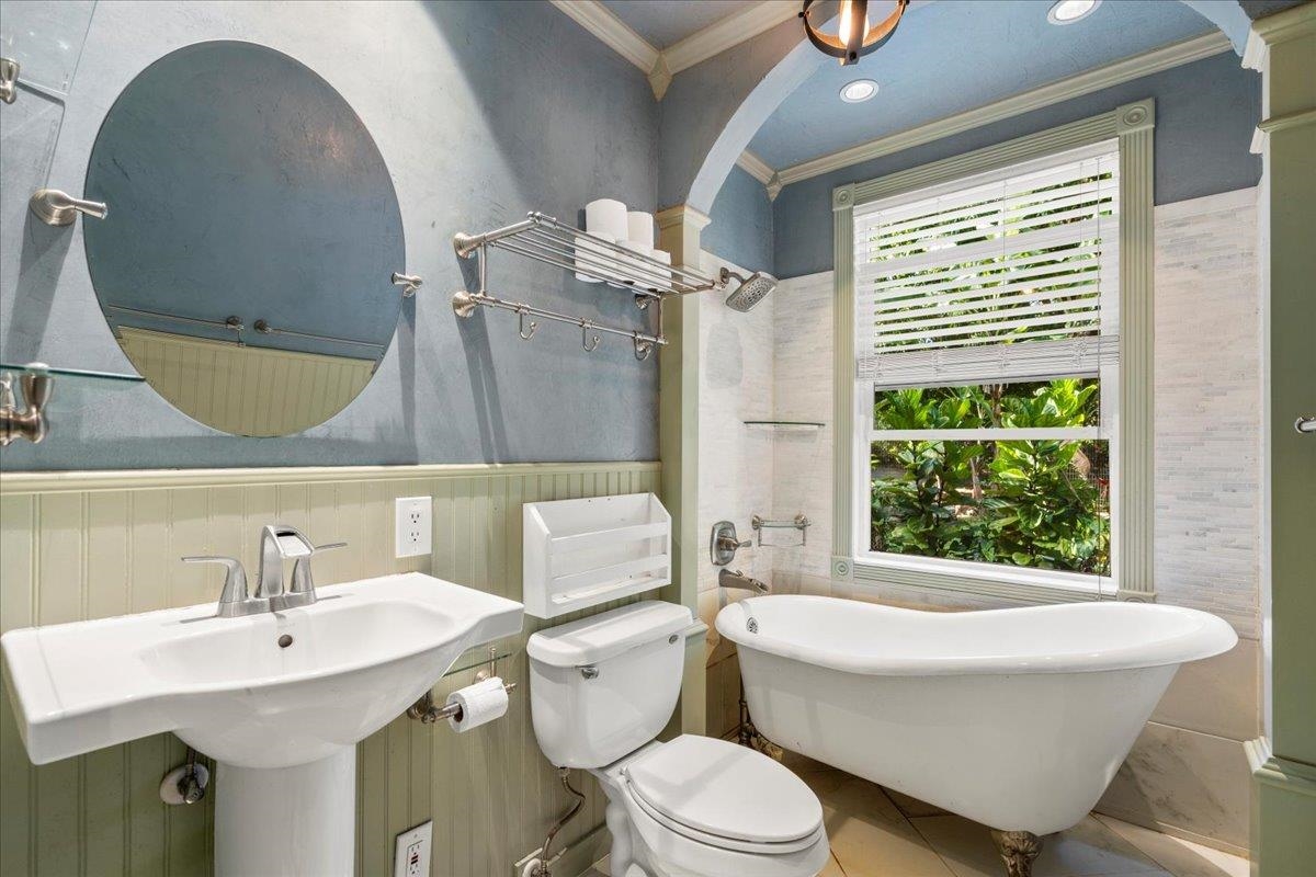 44 Kaupakalua Road Haiku, HI 96708 - Photo 42 of 48 a bathroom with a toilet a sink and a mirror