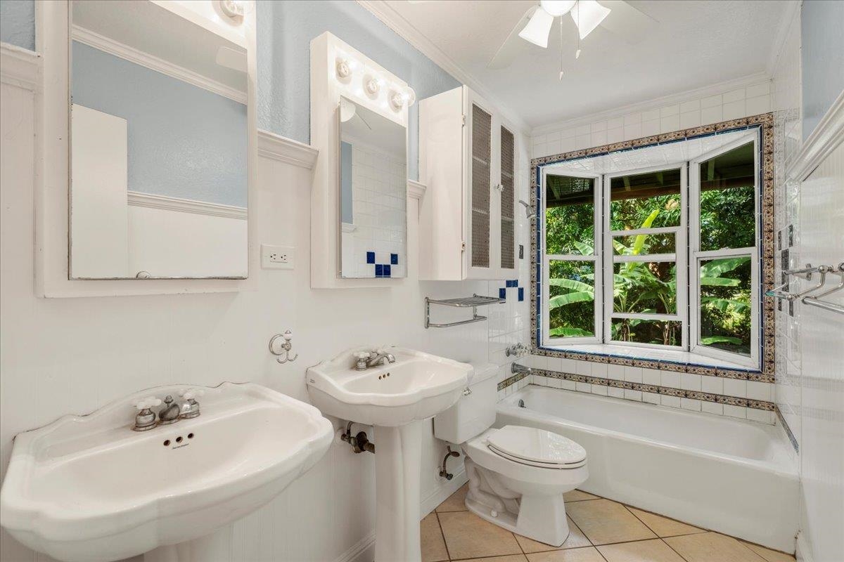 44 Kaupakalua Road Haiku, HI 96708 - Photo 44 of 48 a bathroom with a sink toilet and shower