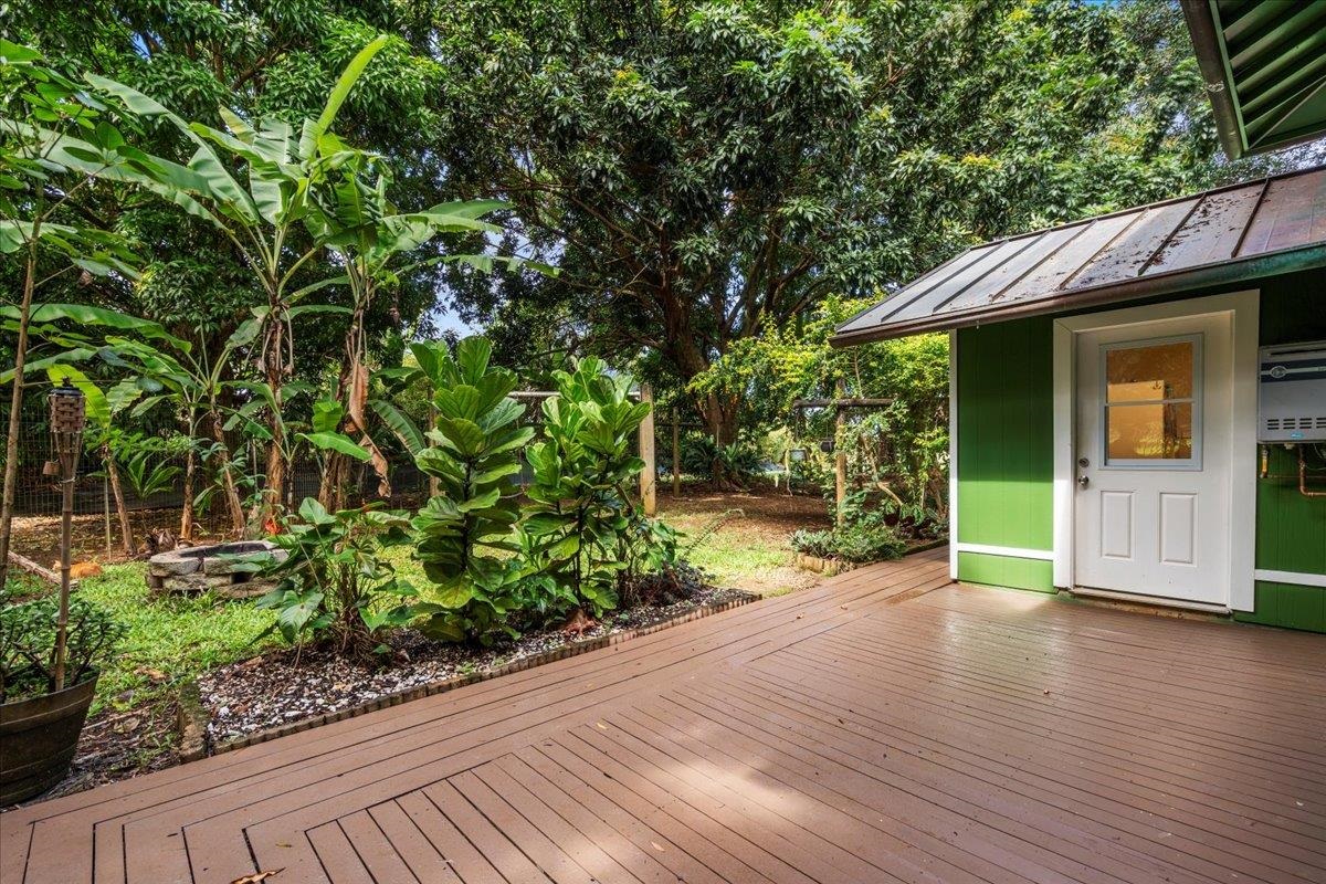 44 Kaupakalua Road Haiku, HI 96708 - Photo 45 of 48 a view of a garden with wooden deck