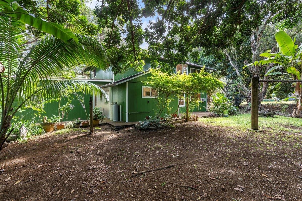 44 Kaupakalua Road Haiku, HI 96708 - Photo 46 of 48 a view of a house with a tree and plants