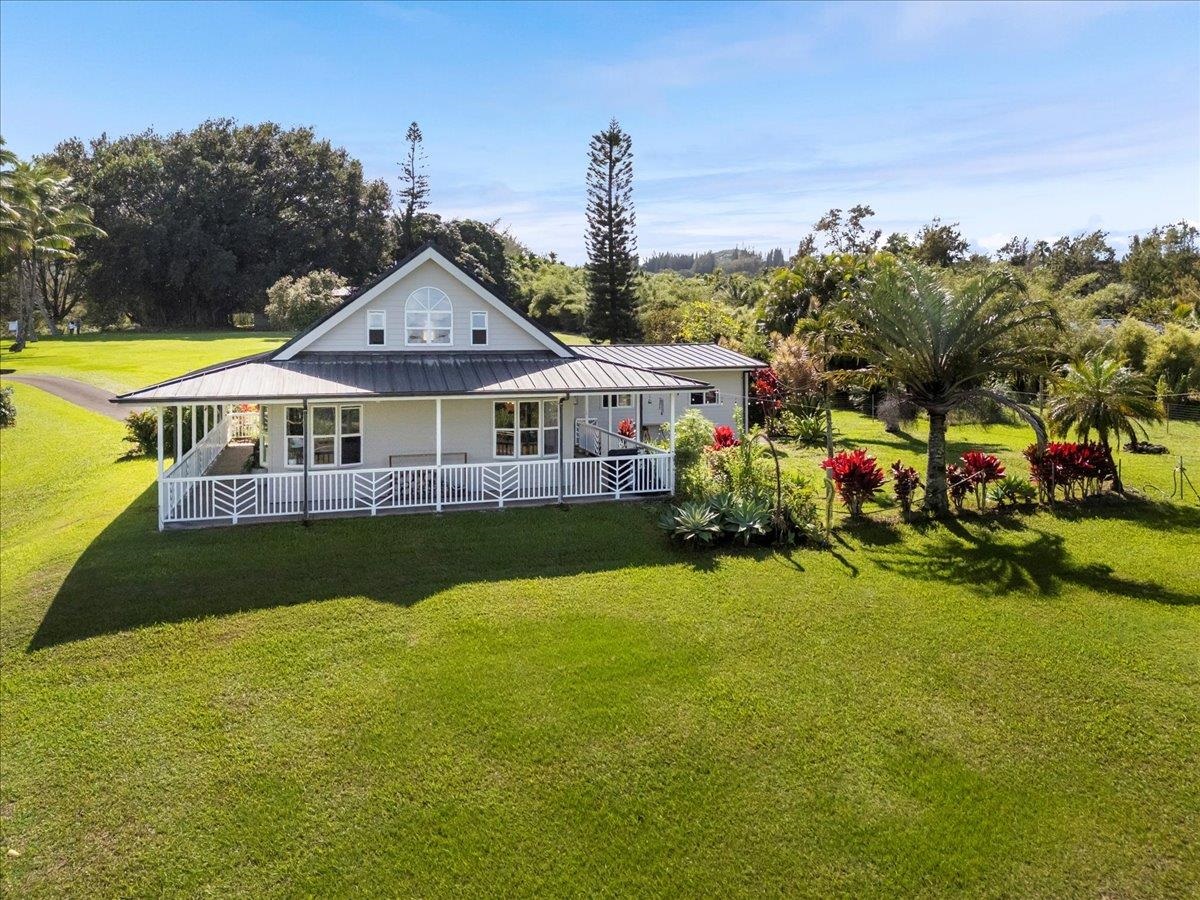 44 Kaupakalua Road Haiku, HI 96708 - Photo 8 of 48 a view of a house with swimming pool and sitting area
