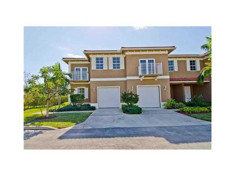 10336 Southwest Sandalfoot Boulevard, Unit 5 Boca Raton, FL 33428 - Photo 1 of 13 Exterior Front