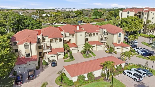 an aerial view of residential houses and outdoor space