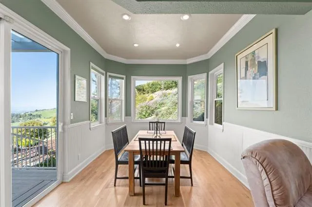 a view of entryway with wooden floor and stairs