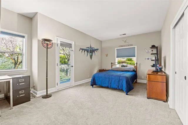 a view of a hallway with living room and furniture