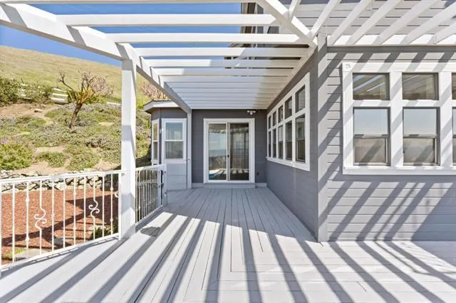 a view of deck with furniture and wooden floor