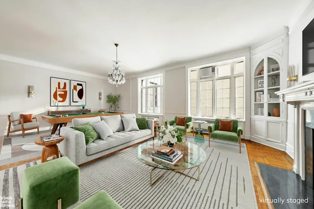 a large white bathroom with a granite countertop sink a toilet and shower