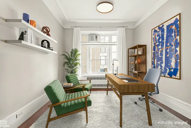 a spacious bedroom with a bed and a window