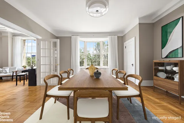 a kitchen with stainless steel appliances a stove a sink cabinets and a counter top space