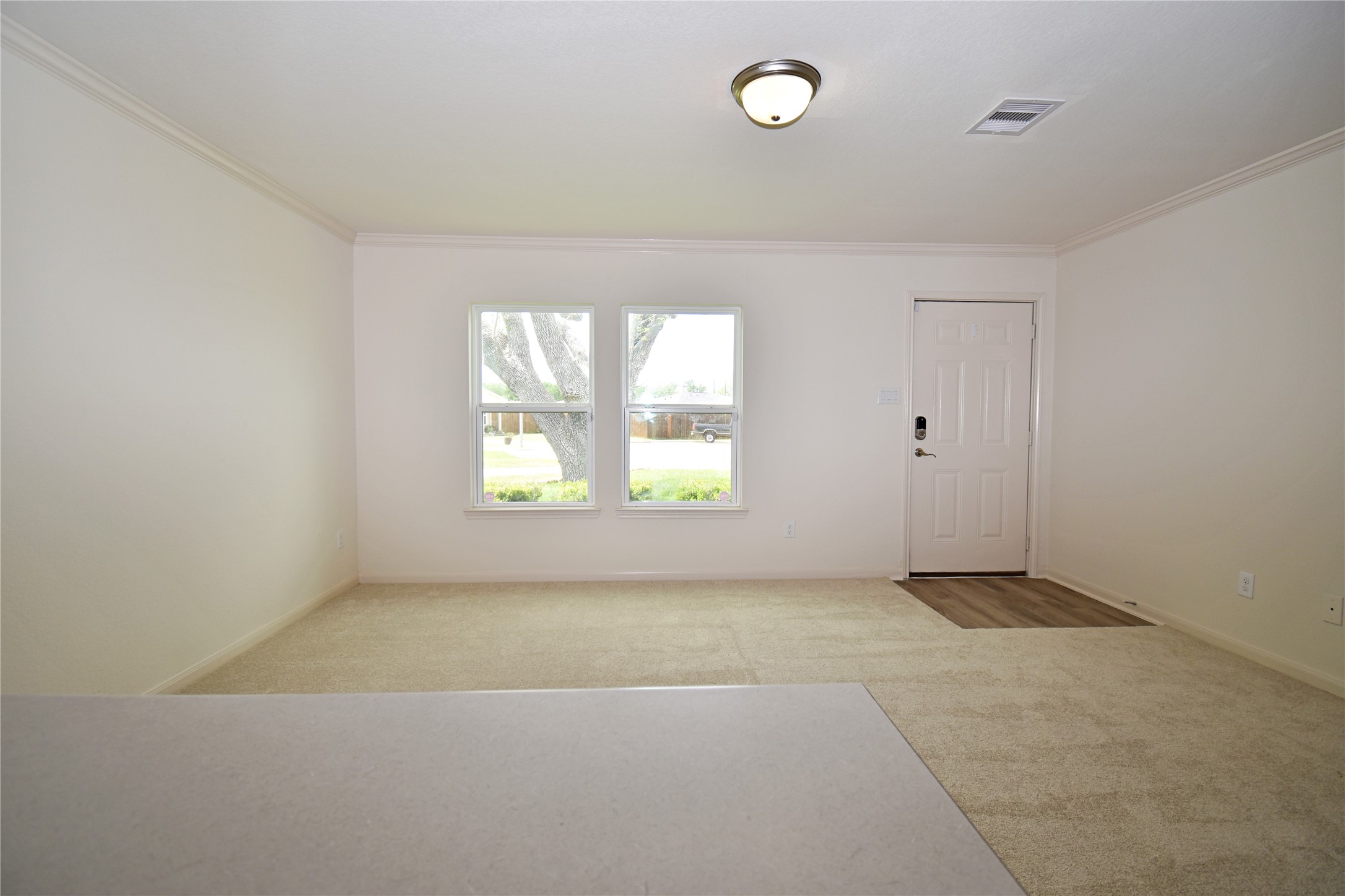 106 Collins Court Kendleton, TX 77451 - Photo 7 of 13 an empty room with windows