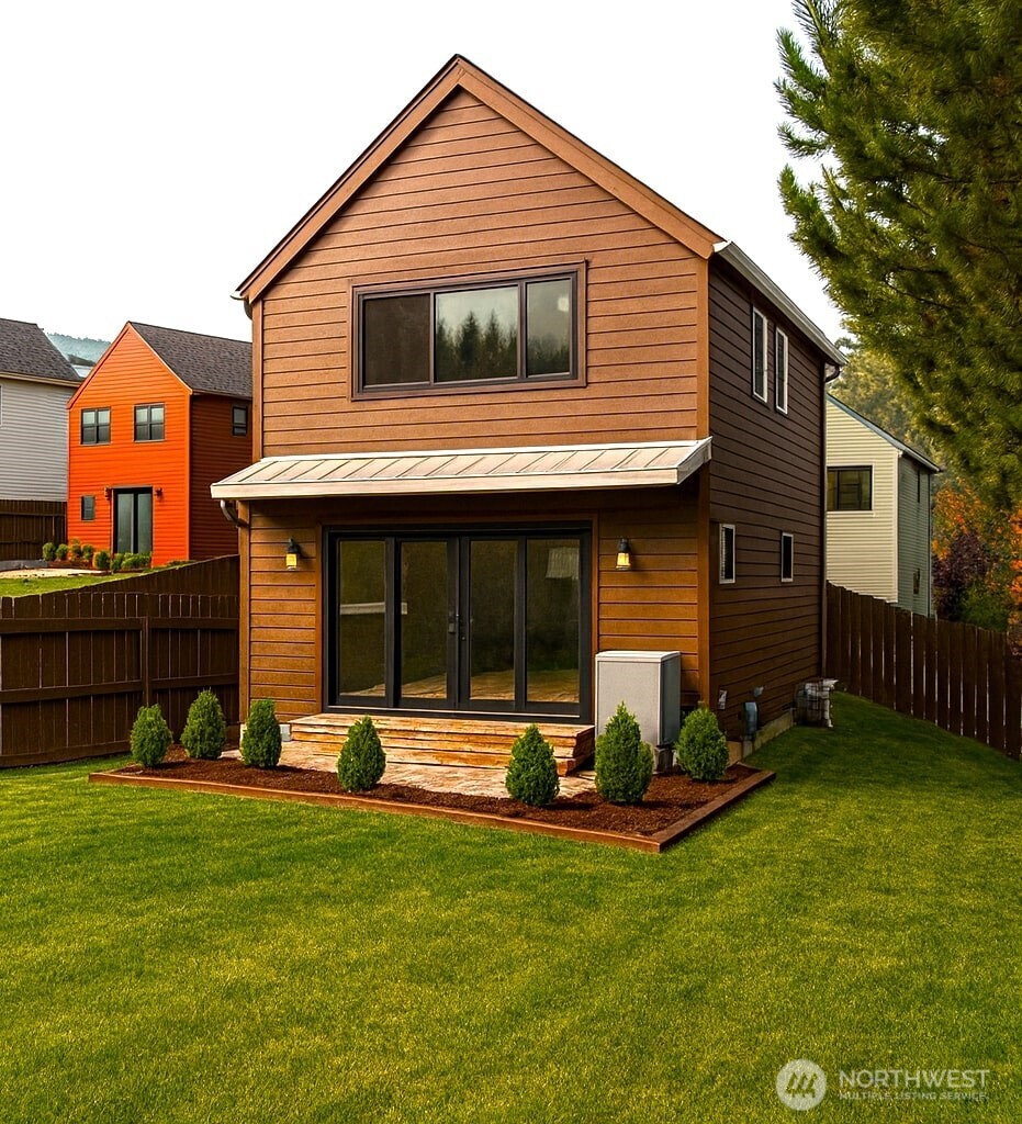 1322 St Paul Street Bellingham, WA 98229 - Photo 9 of 10 a front view of a house with a yard