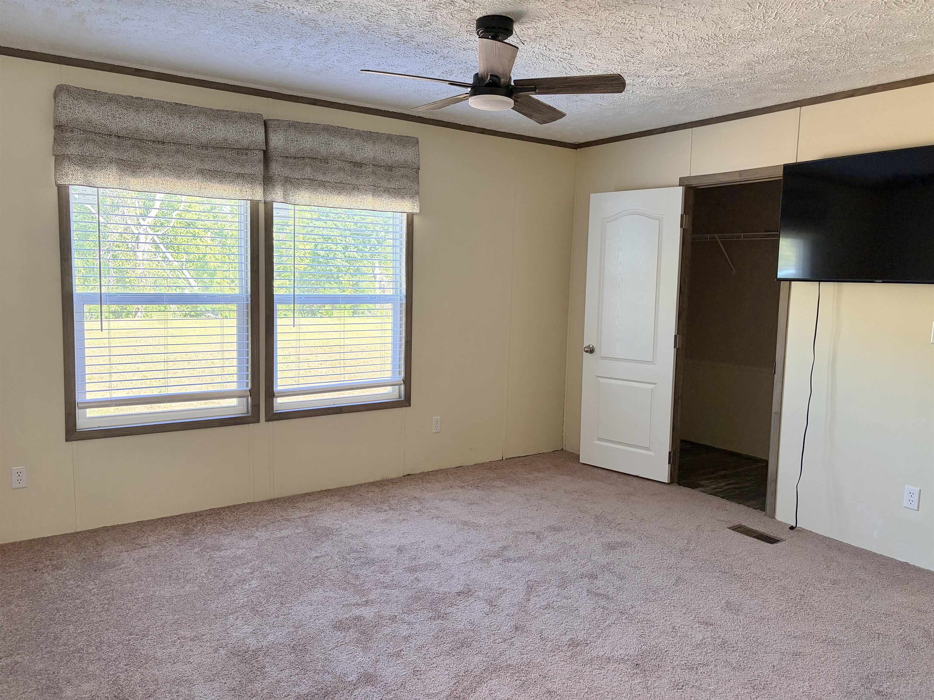 2030 Nubbin Ridge Road Middleton, TN 38052 - Photo 13 of 28 a view of an empty room with a window