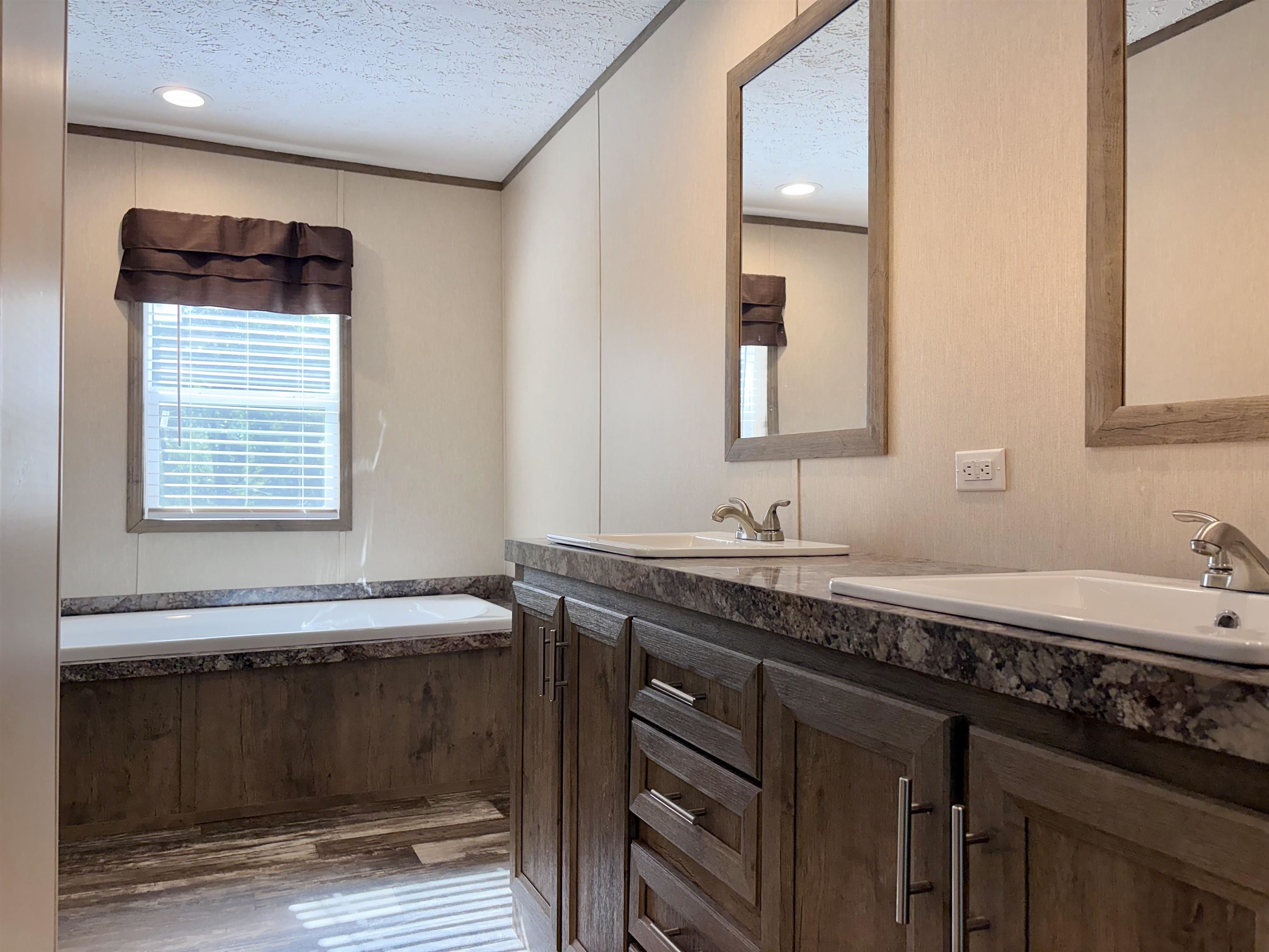 2030 Nubbin Ridge Road Middleton, TN 38052 - Photo 15 of 28 a bathroom with a sink and a mirror