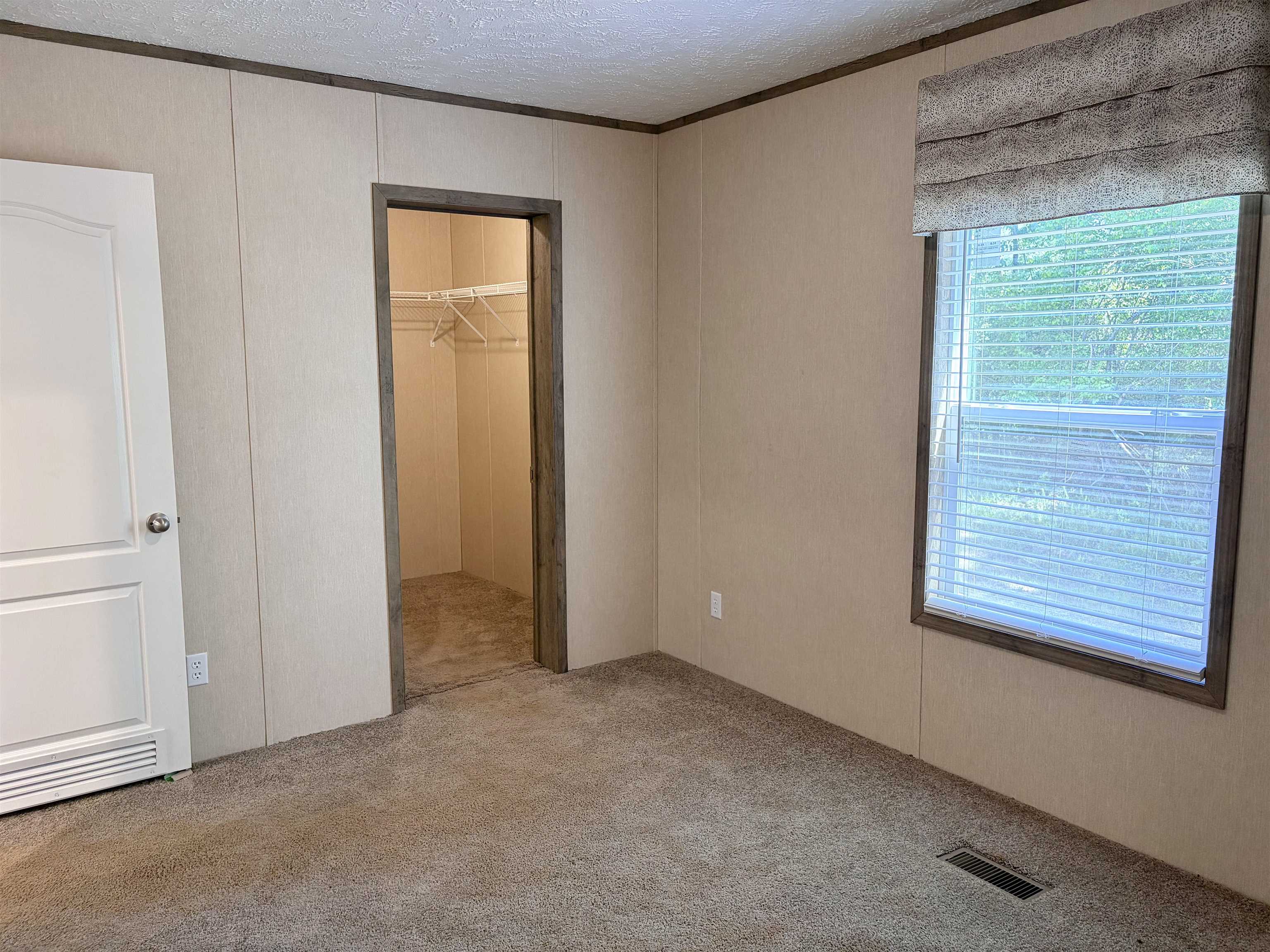 2030 Nubbin Ridge Road Middleton, TN 38052 - Photo 20 of 28 an empty room with windows