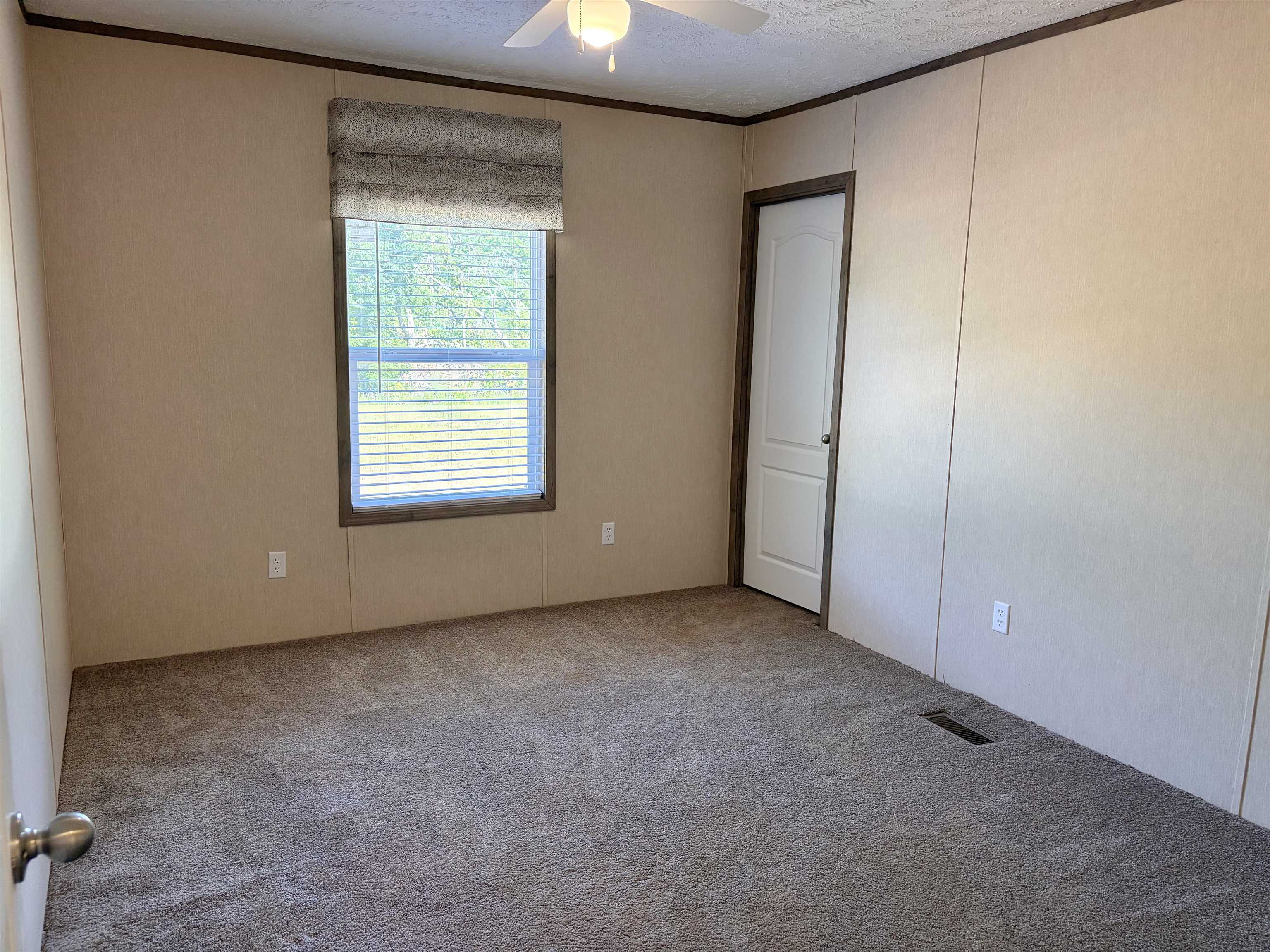 2030 Nubbin Ridge Road Middleton, TN 38052 - Photo 25 of 28 an empty room with a window