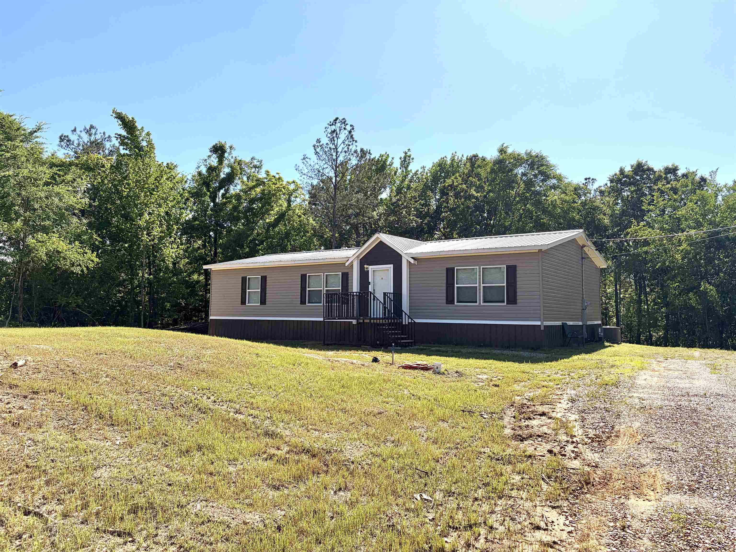 2030 Nubbin Ridge Road Middleton, TN 38052 - Photo 3 of 28 a view of a house with a big yard