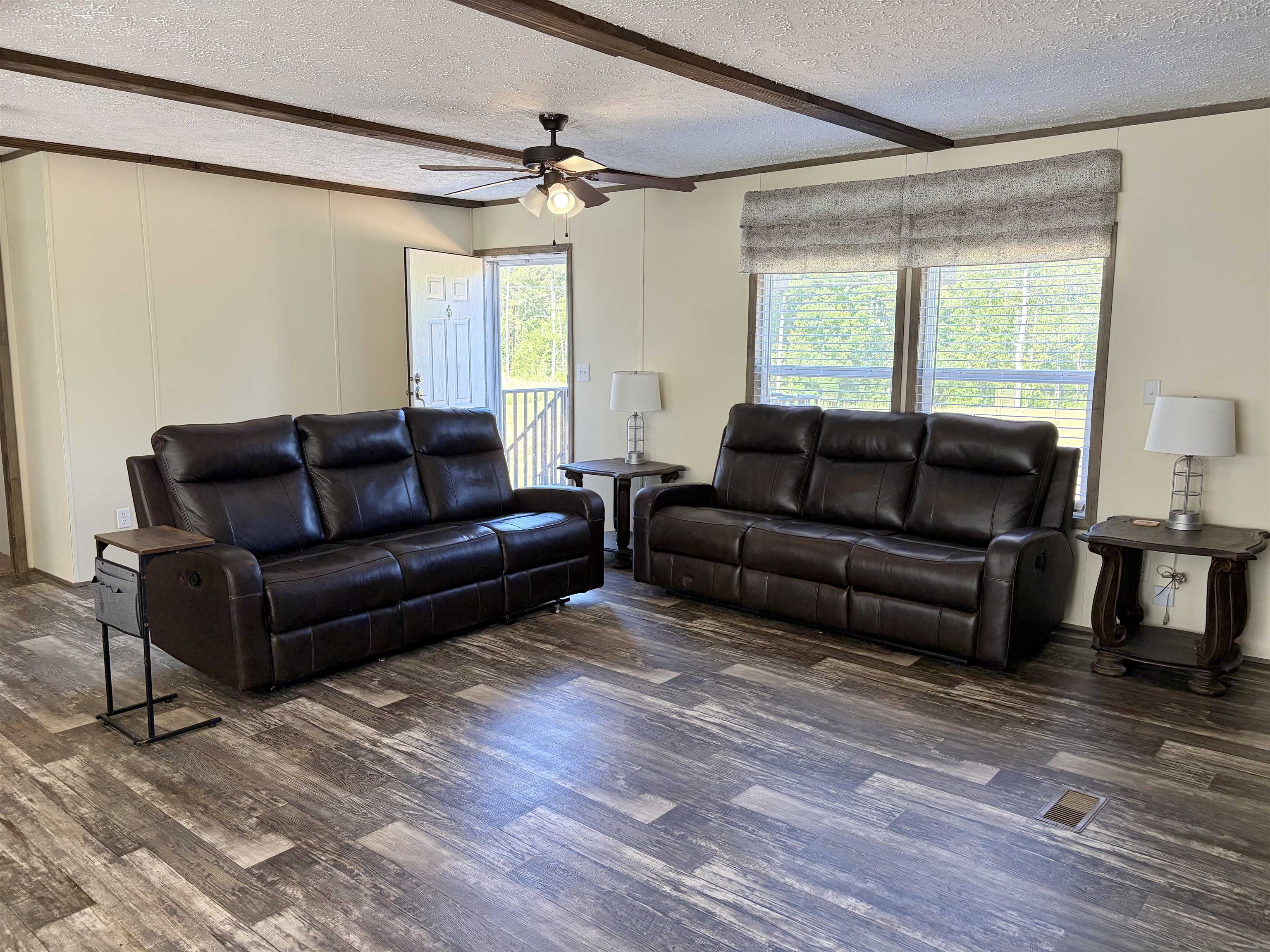2030 Nubbin Ridge Road Middleton, TN 38052 - Photo 5 of 28 a living room with furniture window and wooden floor
