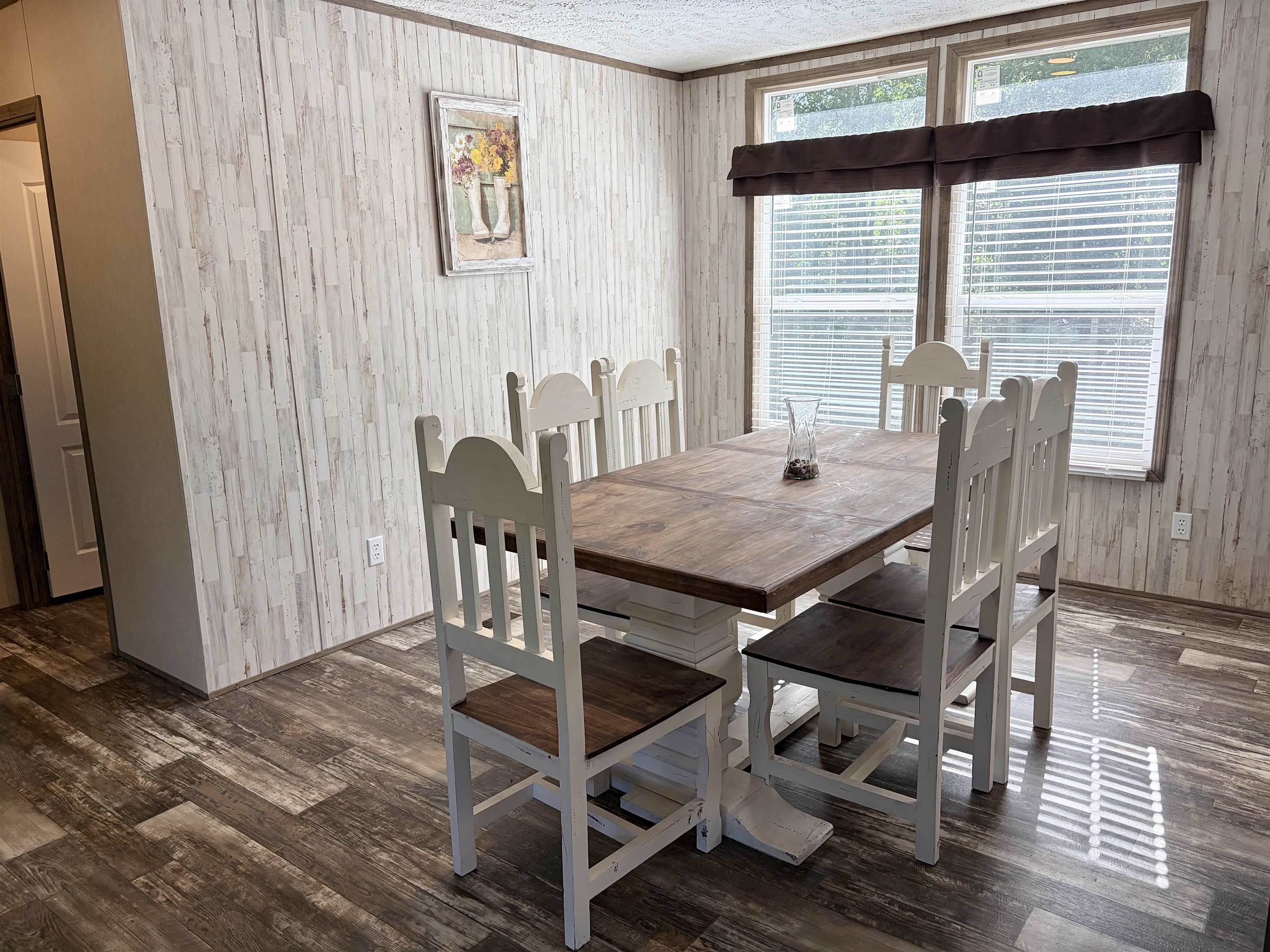 2030 Nubbin Ridge Road Middleton, TN 38052 - Photo 10 of 28 a view of a dining room with furniture window and wooden floor