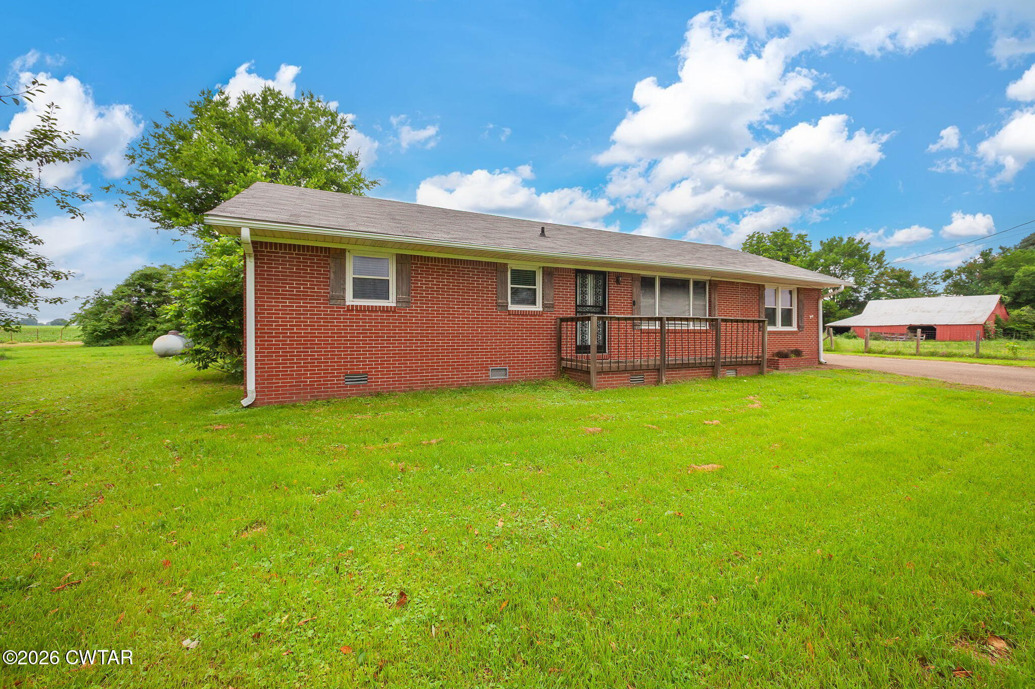 1921 Nance Road Alamo, TN 38001 - Photo 2 of 29 a view of a house with a backyard