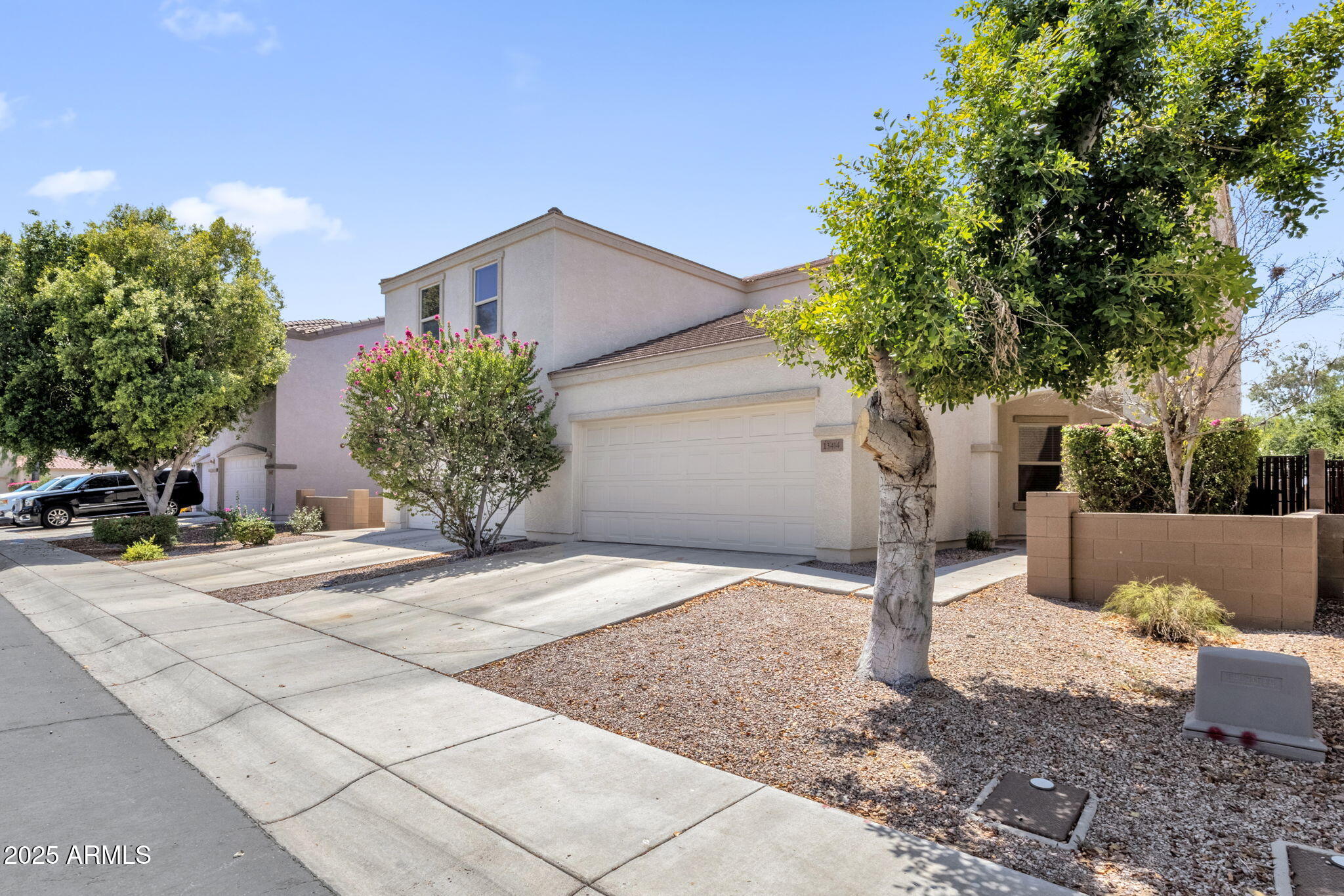 13414 North 87th Lane Peoria, AZ 85381 - Photo 1 of 45 a house view with a outdoor space