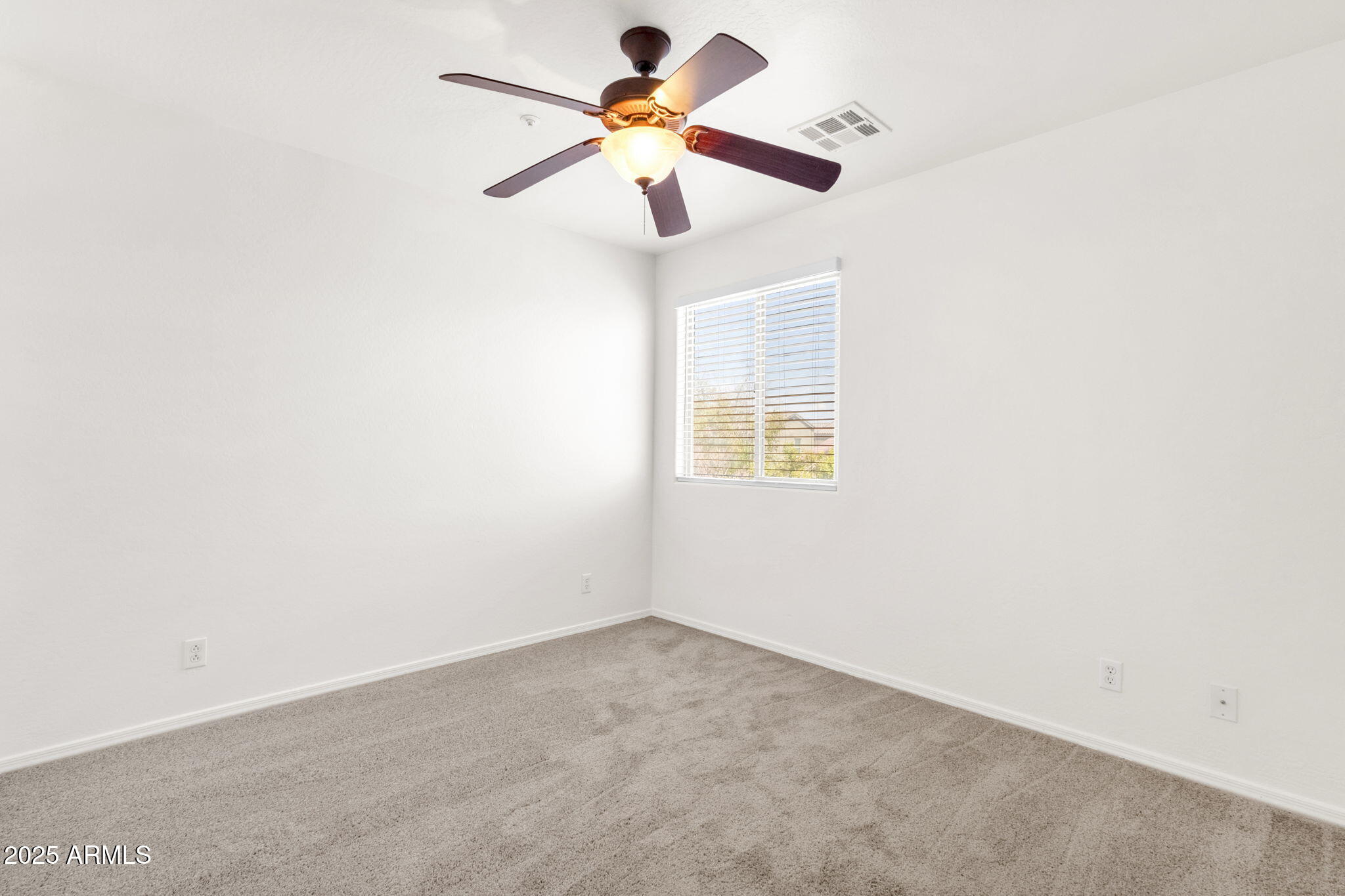 13414 North 87th Lane Peoria, AZ 85381 - Photo 22 of 45 a window in an empty room