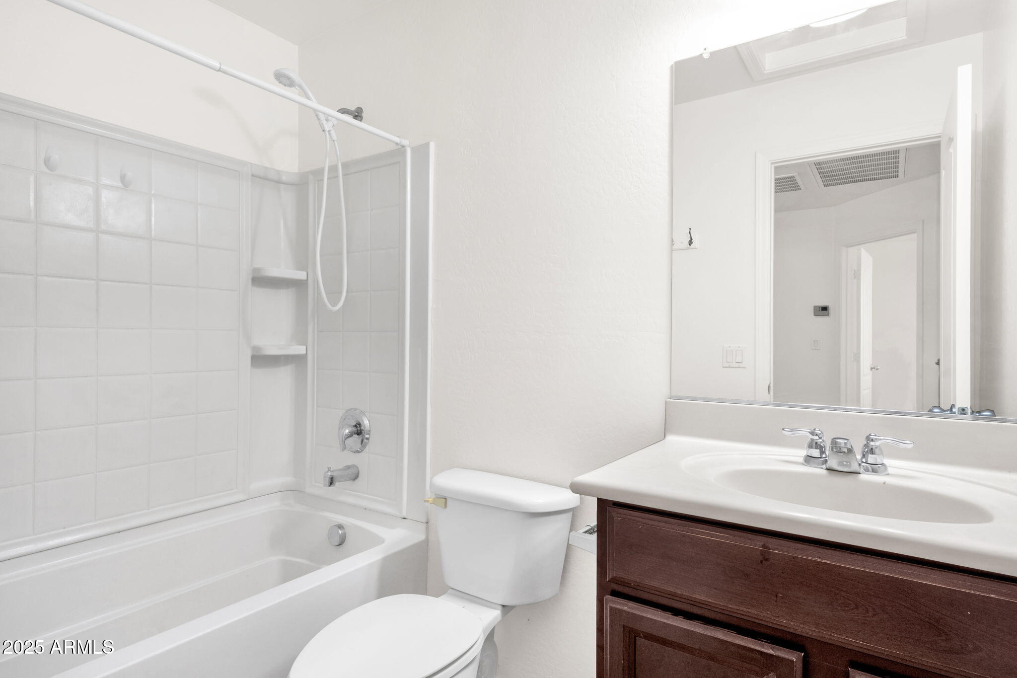 13414 North 87th Lane Peoria, AZ 85381 - Photo 25 of 45 a bathroom with a sink and a toilet