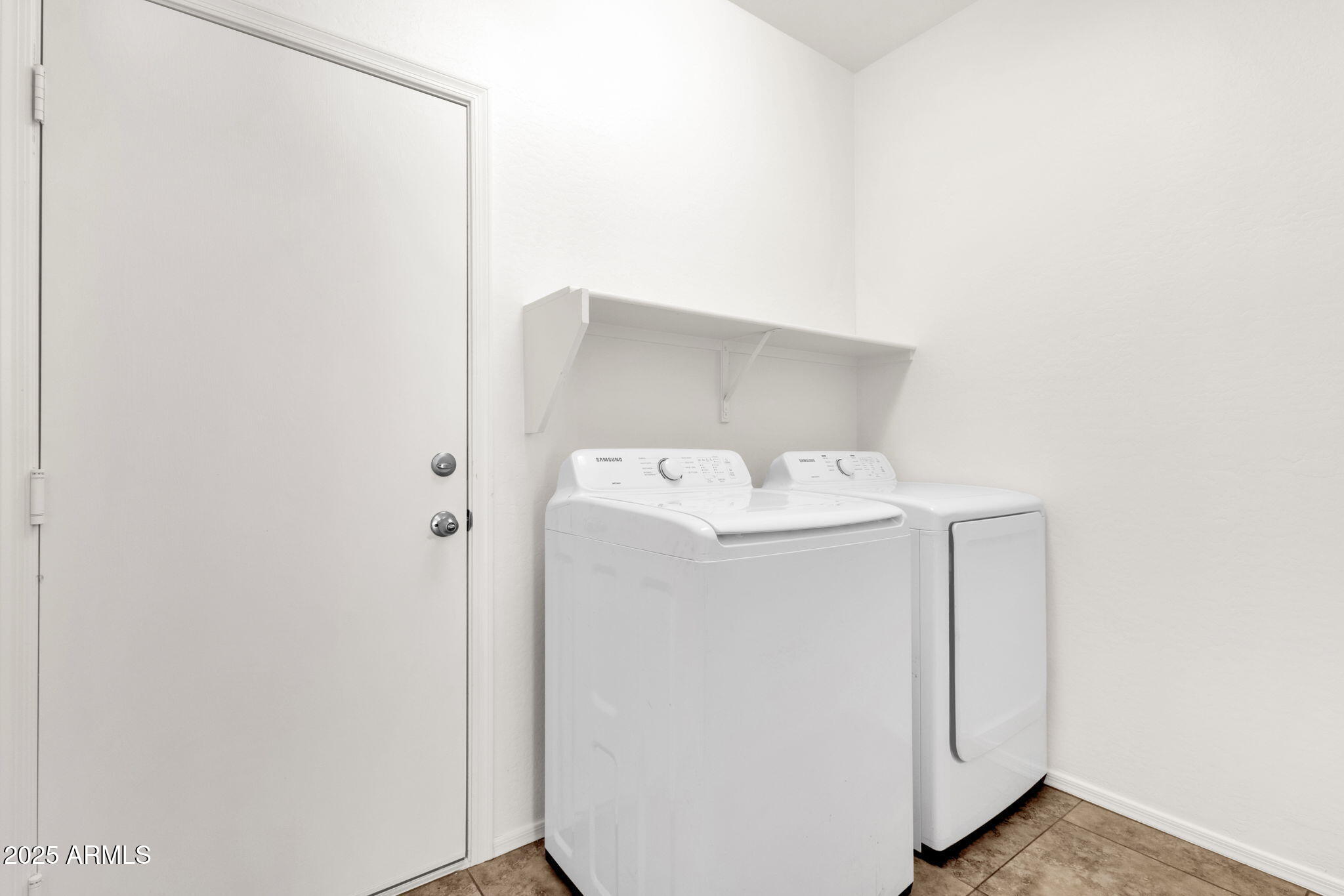 13414 North 87th Lane Peoria, AZ 85381 - Photo 35 of 45 a utility room with a sink washer and dryer