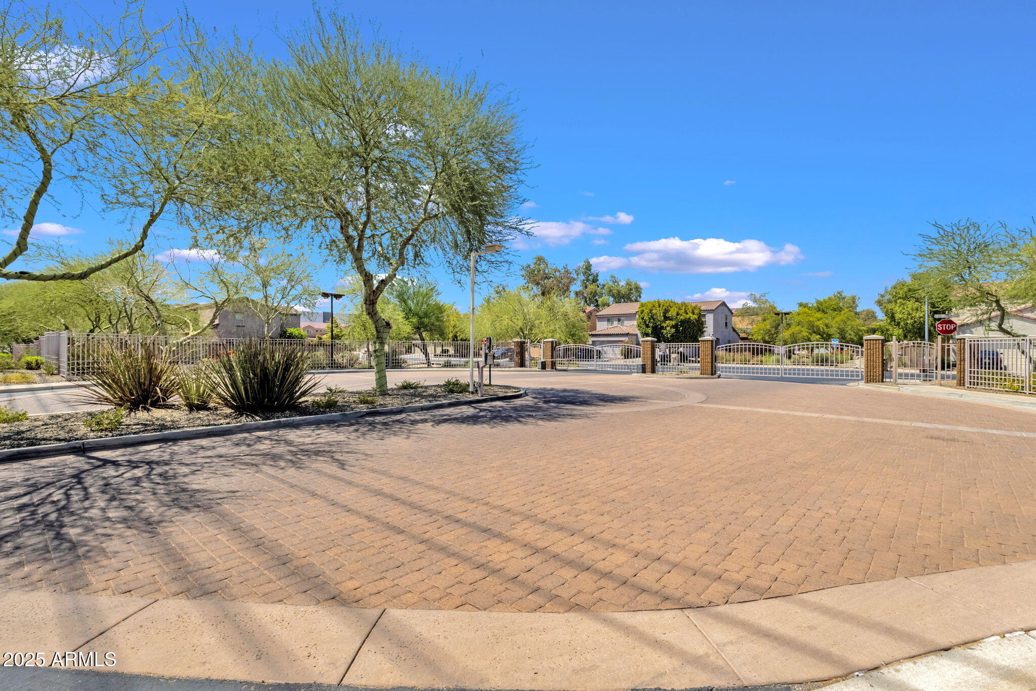 13414 North 87th Lane Peoria, AZ 85381 - Photo 37 of 45 a view of street with palm trees