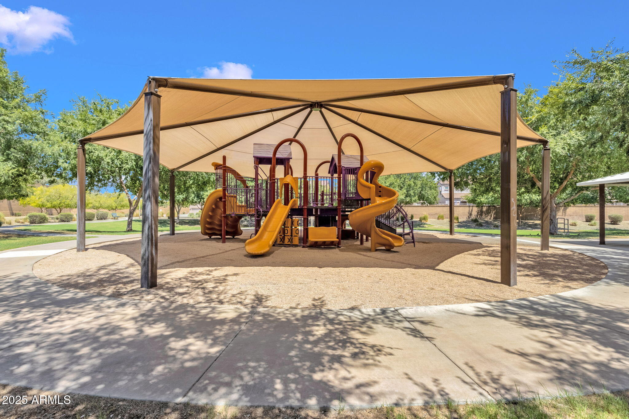 13414 North 87th Lane Peoria, AZ 85381 - Photo 42 of 45 a view of tall trees with a entertaining space