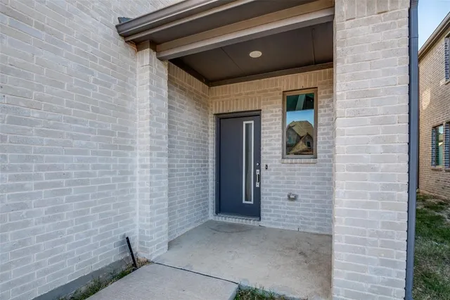 a brick house with a door