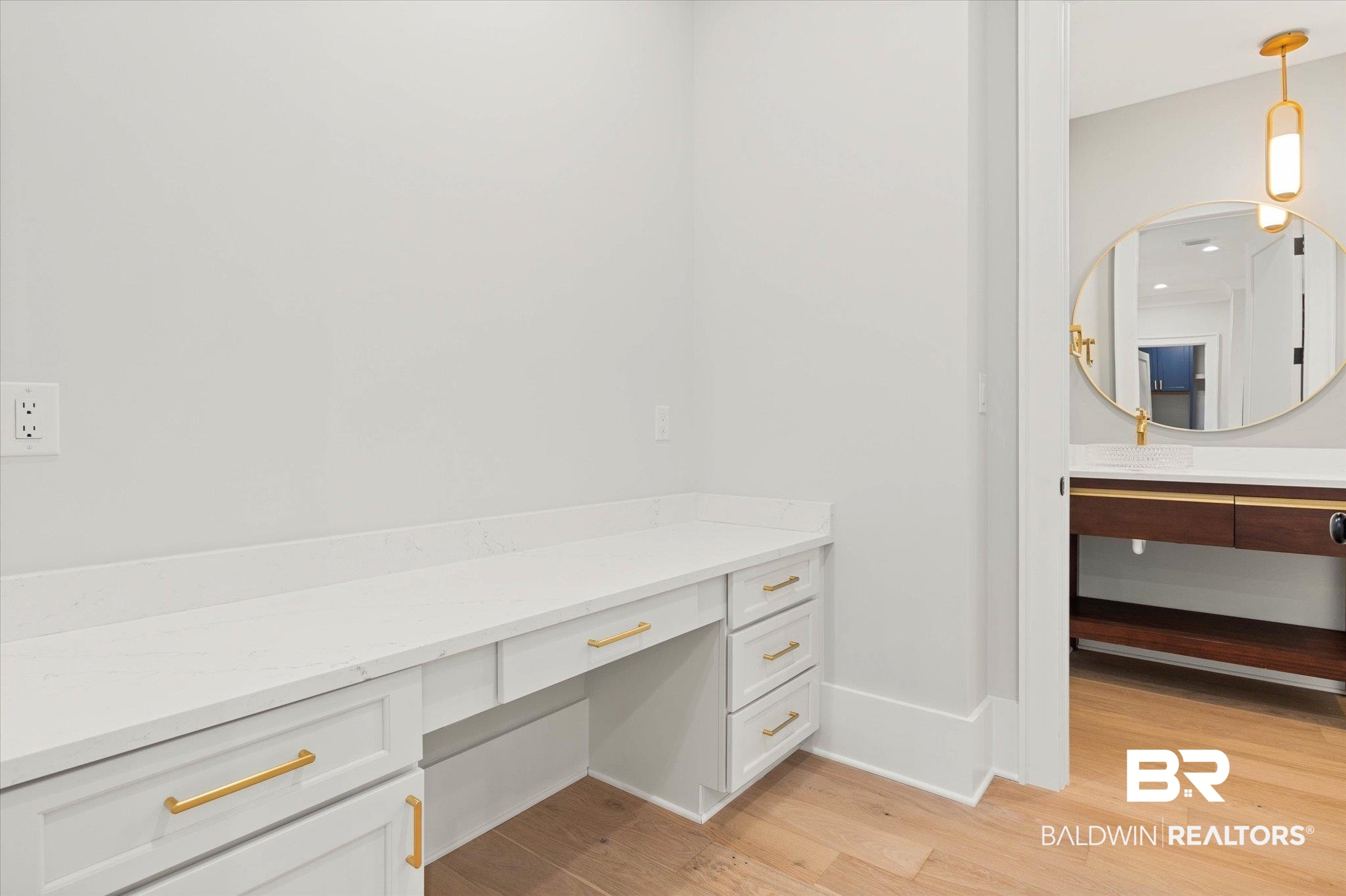 853 Inlet Circle Gulf Shores, AL 36542 - Photo 4 of 55 Bathroom featuring vanity, baseboards, and wood finished floors