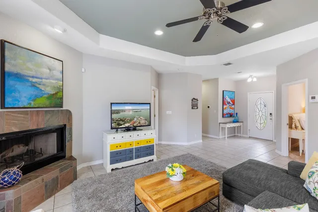 a kitchen with stainless steel appliances granite countertop a refrigerator sink and stove