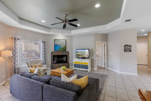 a kitchen with stainless steel appliances granite countertop a stove refrigerator and cabinets