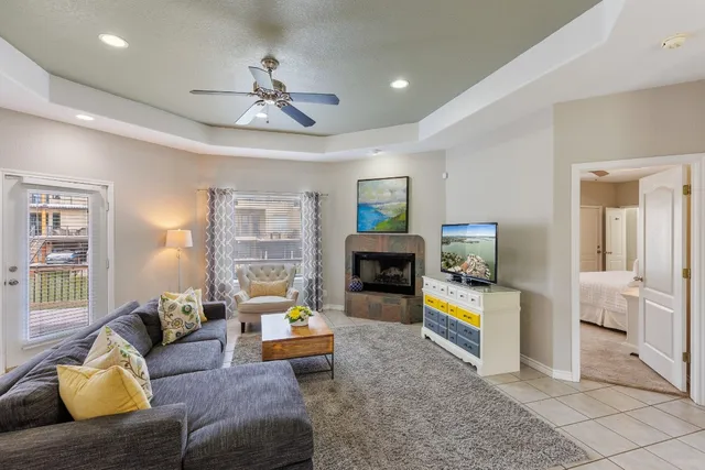 a kitchen with stainless steel appliances a stove microwave and refrigerator