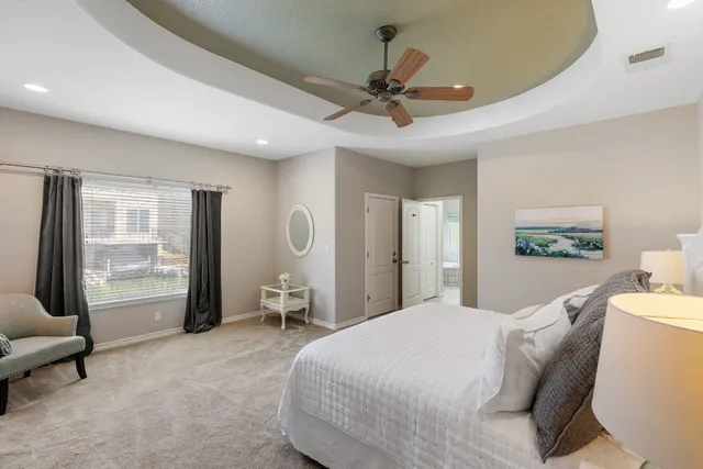 a bathroom with a tub and shower
